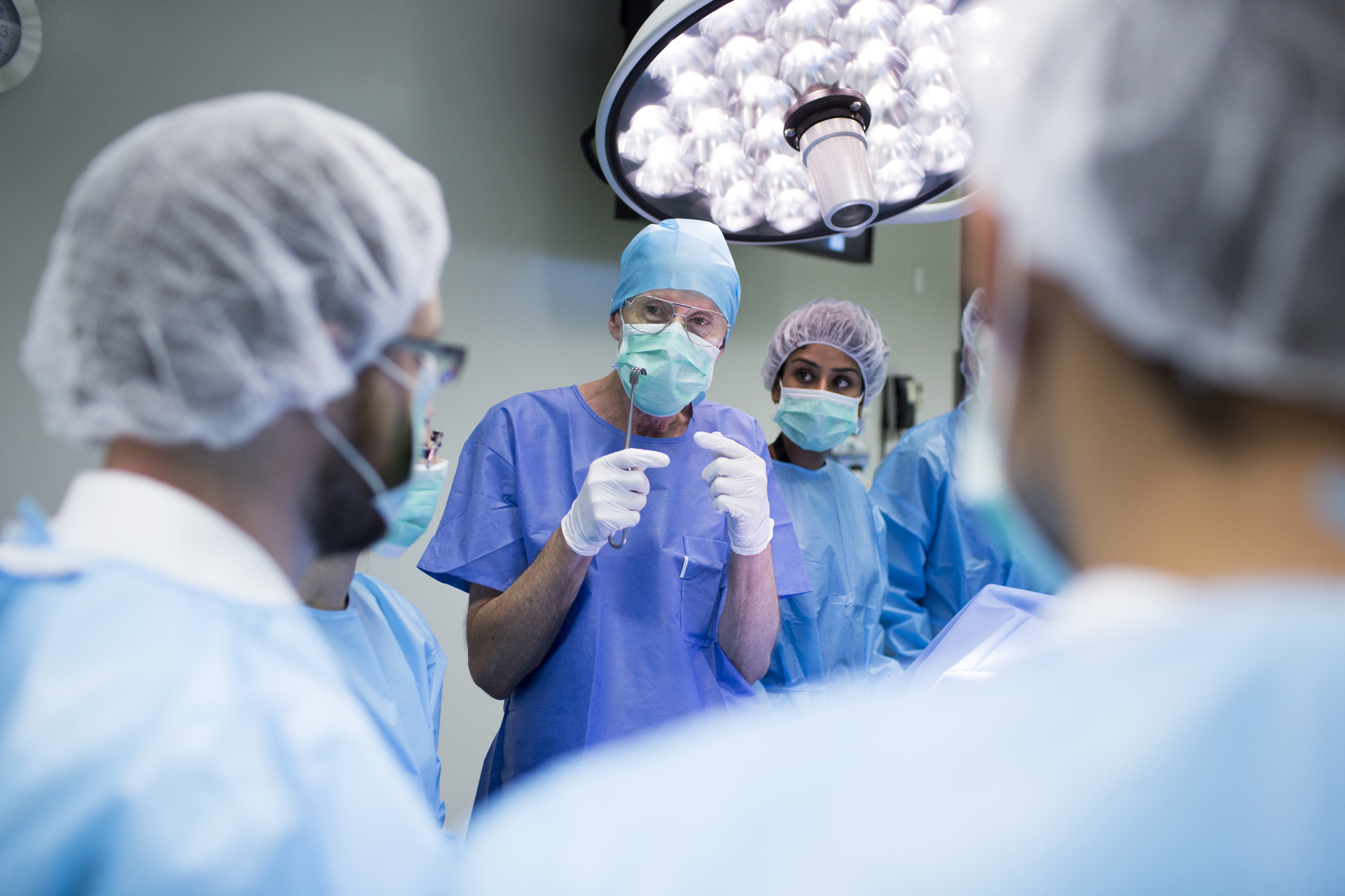 A group of people in surgical scrubs at the Surgical and Anatomical Science Facility at the University of Technology Sydney.