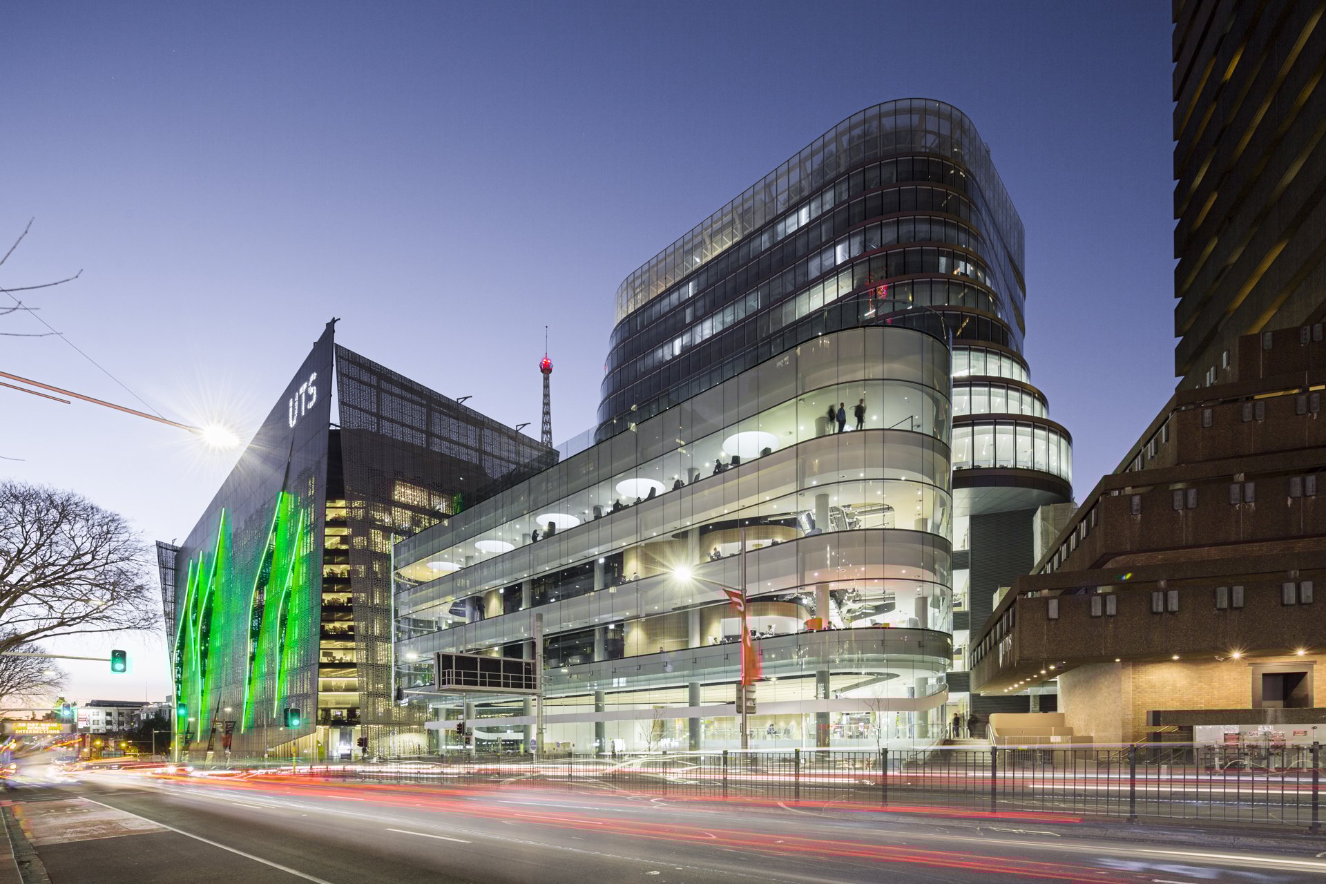 The University of Technology Sydney Central, Tower and the Faculty of Engineering and Information Technology buildings as seen from the street in the early evening.